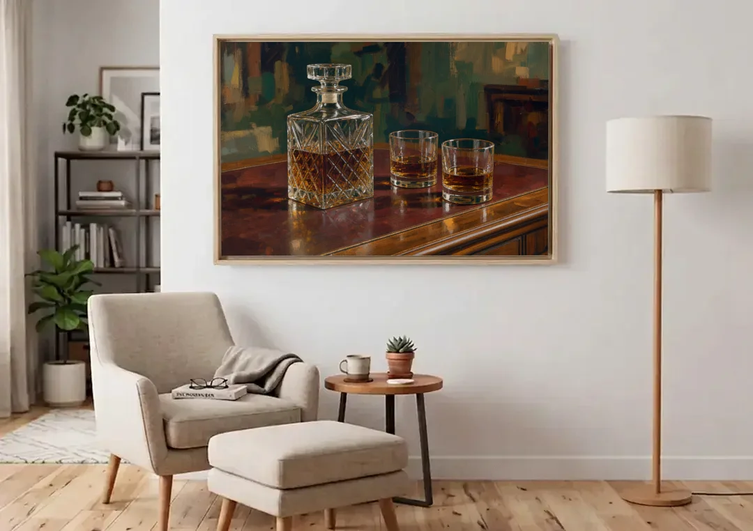 Home Bar Decor with Crystal Decanter and Bourbon canvas wall art above an armchair in a bright living room