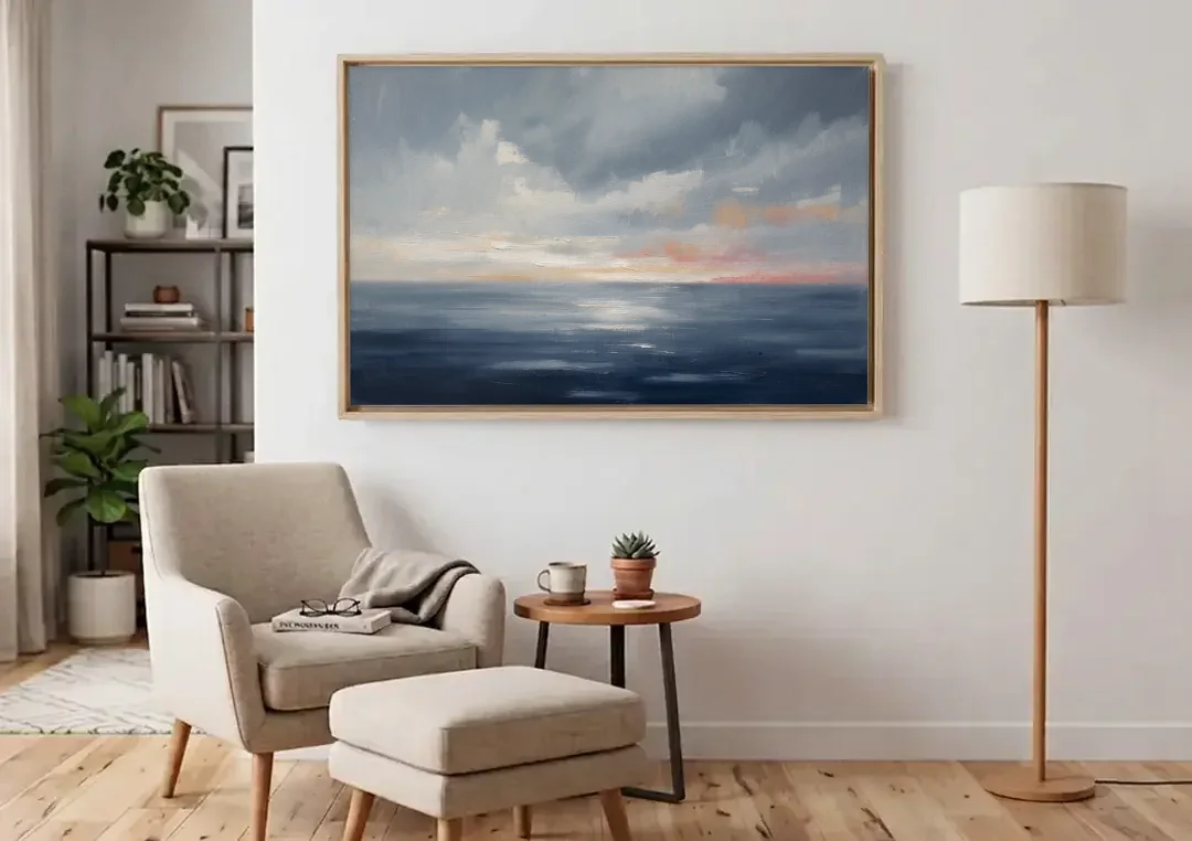 Horizon Line Painting at Blue Hour canvas wall art above an armchair in a bright living room
