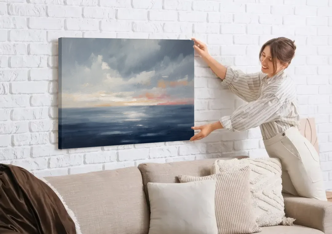 Horizon Line Painting at Blue Hour canvas wall art being hung on a white brick wall above a sofa