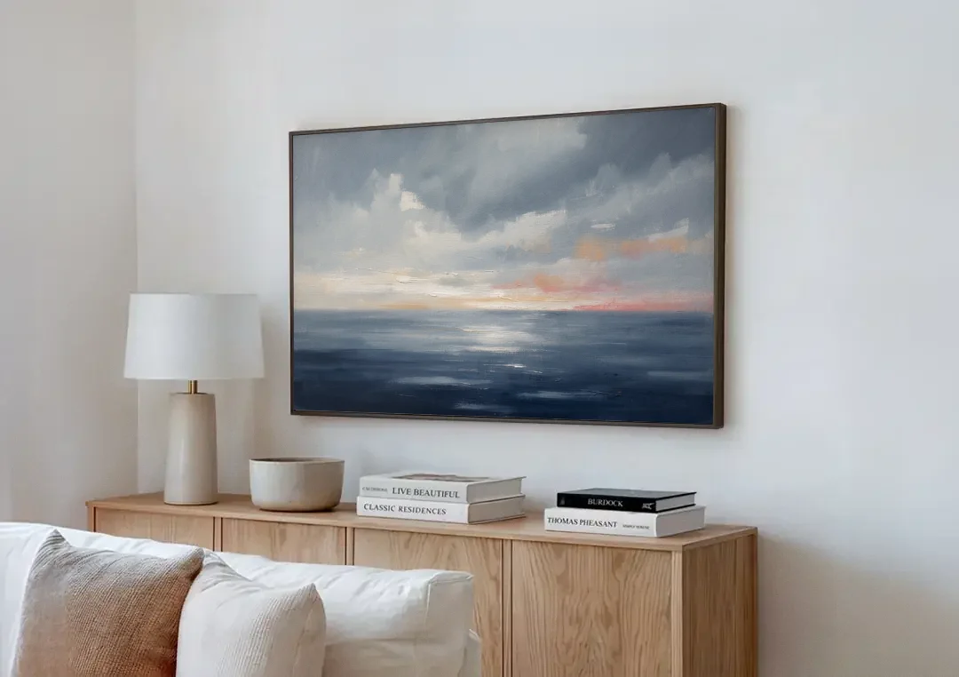 Horizon Line Painting at Blue Hour canvas wall art above a wooden sideboard next to a sofa