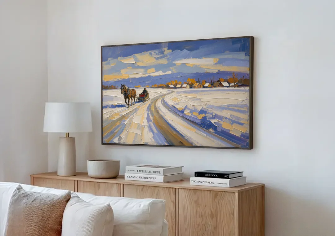 Horse Drawn Sleigh Painting Toward the Village canvas wall art above a wooden sideboard next to a sofa