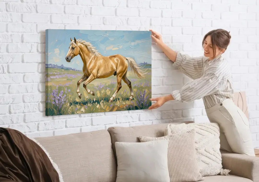 Horse Oil Painting of a Palomino in Lilac Meadow canvas wall art being hung on a white brick wall above a sofa