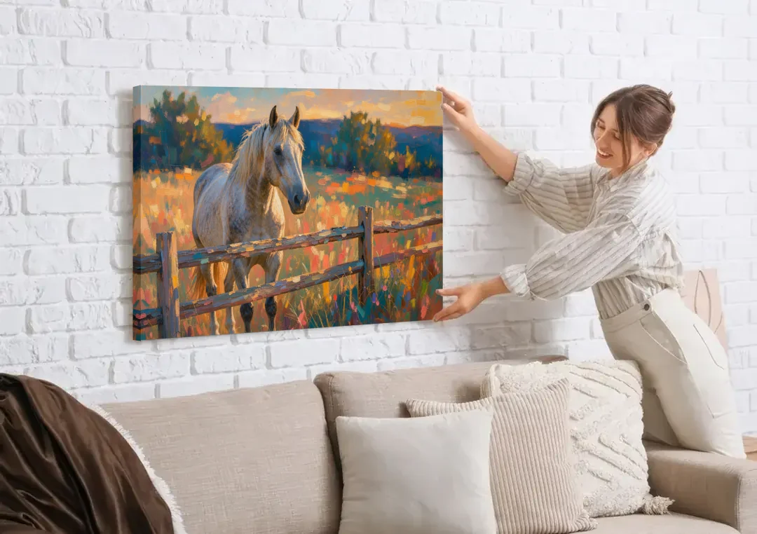 Horse Painting Canvas at the Split-Rail Fence canvas wall art being hung on a white brick wall above a sofa