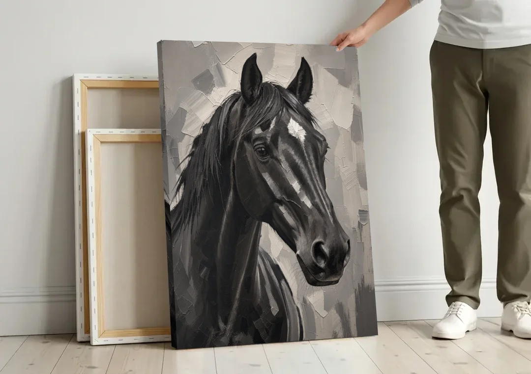 Horse Portrait Painting in Charcoal and Ivory canvas wall art leaning against a wall next to blank canvases