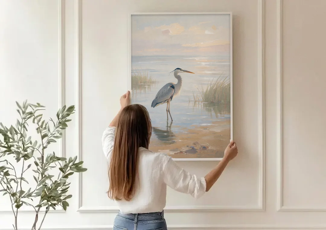 Hotel Room Decor with a Heron in Misty Shallows canvas wall art being hung on a paneled wall