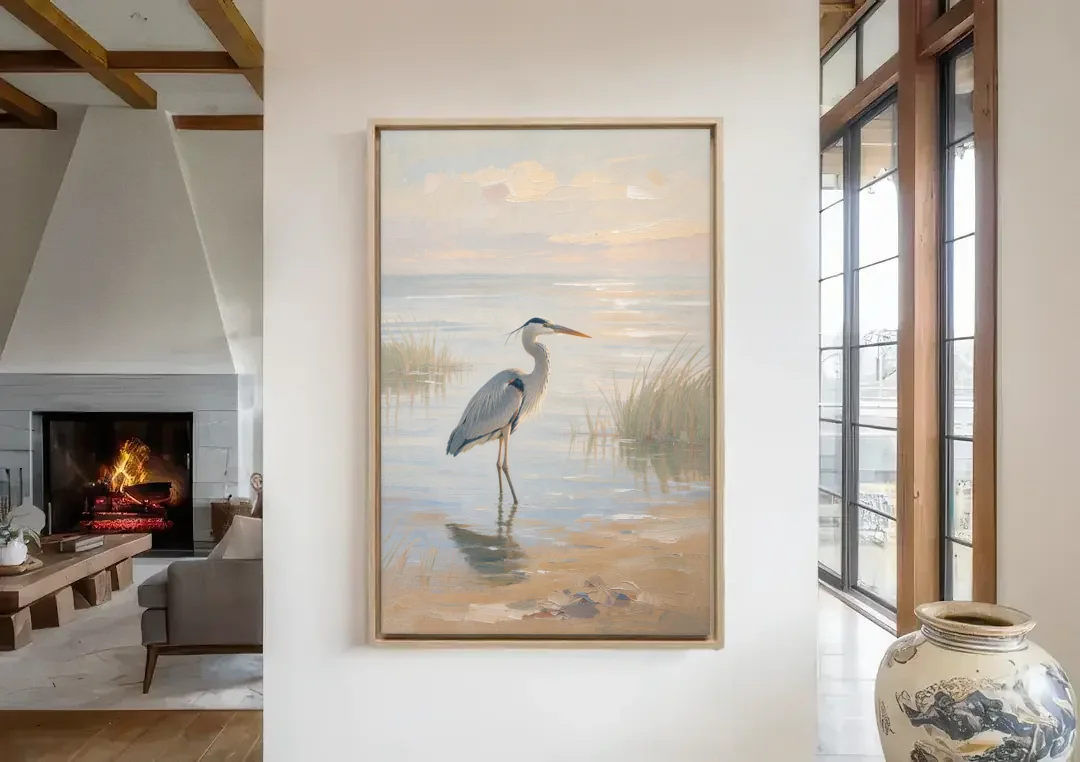 Hotel Room Decor with a Heron in Misty Shallows canvas wall art in a living room with a fireplace