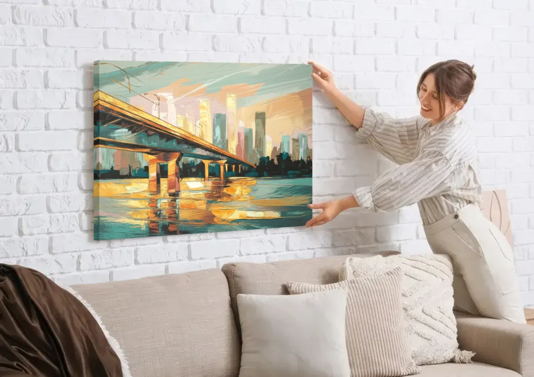 Houston Be Someone Bridge canvas wall art being hung on a white brick wall above a sofa