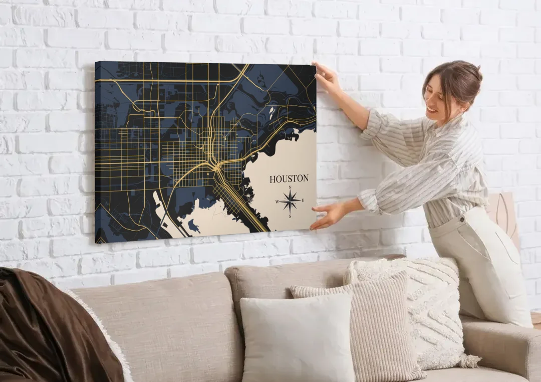 Houston Skyline Horizon canvas wall art being hung on a white brick wall above a sofa