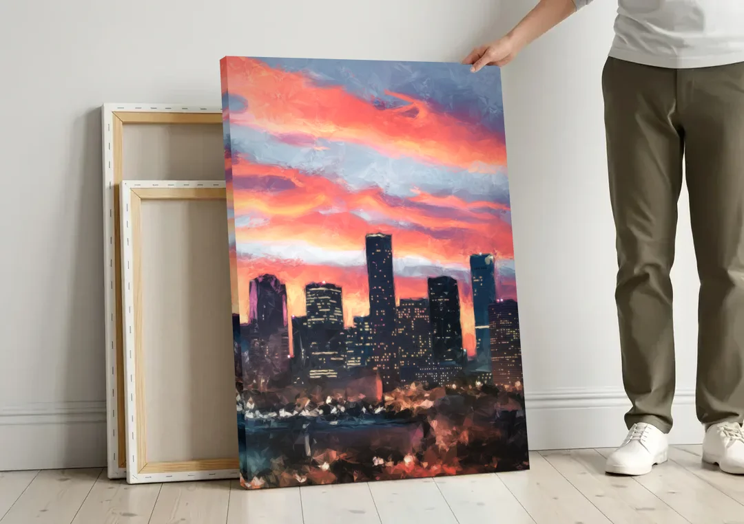 Houston Sunset Skyline canvas wall art leaning against a wall next to blank canvases