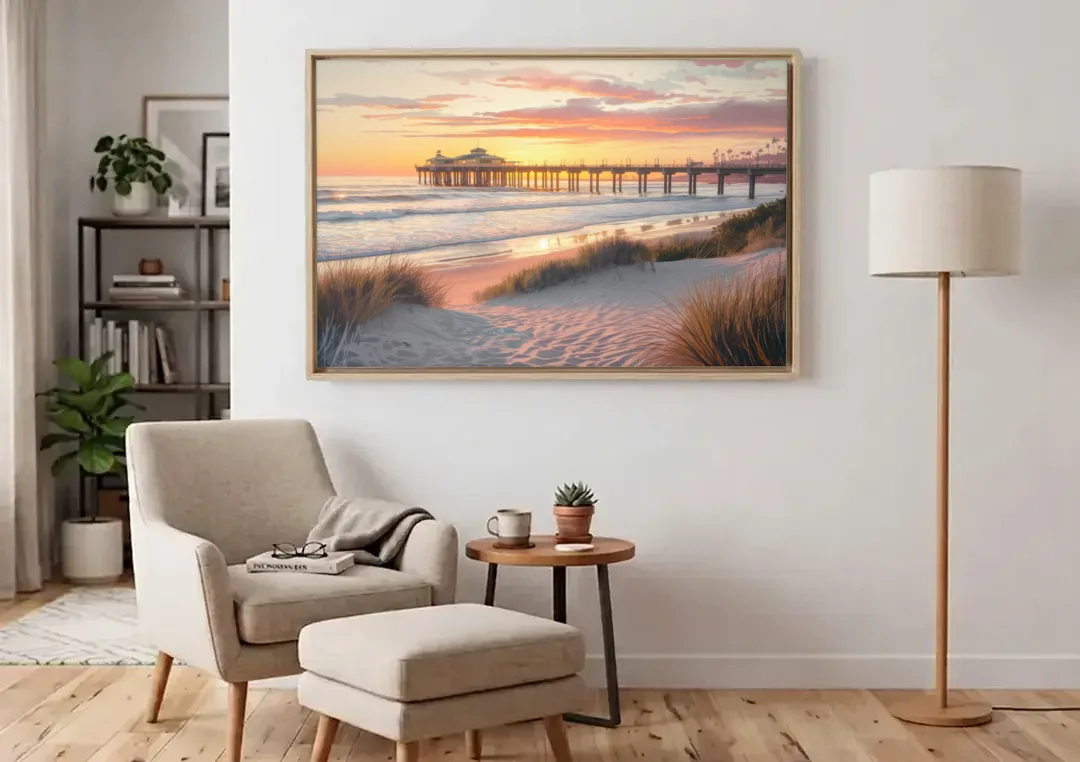 Huntington Beach Coastal Vibes canvas wall art above an armchair in a bright living room