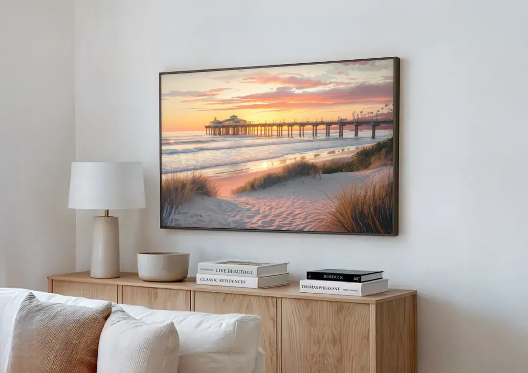 Huntington Beach Coastal Vibes canvas wall art above a wooden sideboard next to a sofa