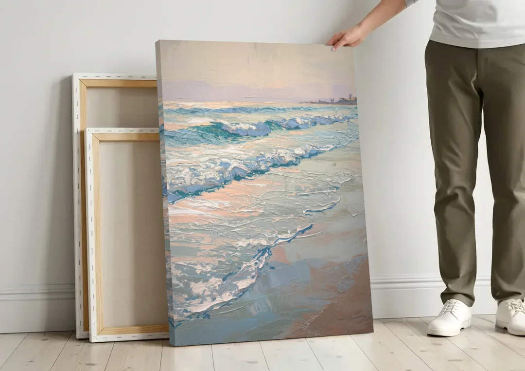 Huntington Beach Ocean Waves canvas wall art leaning against a wall next to blank canvases