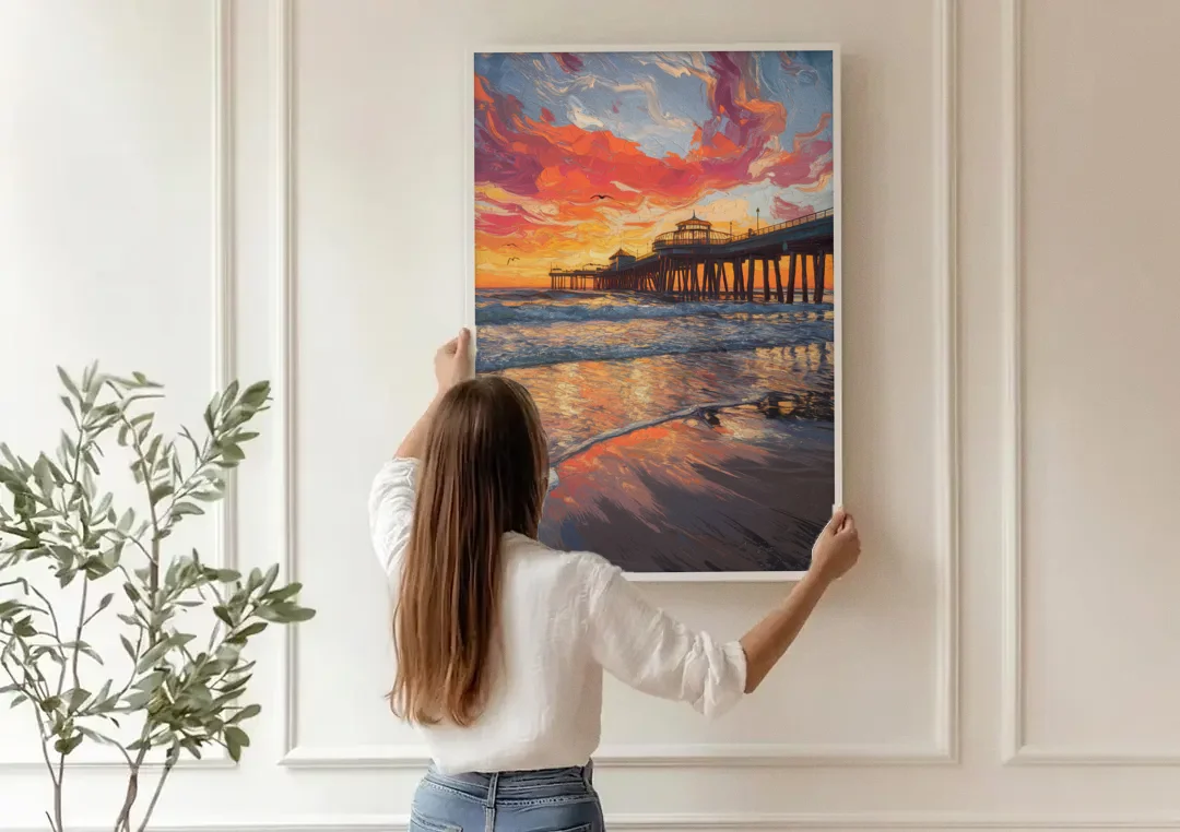 Huntington Beach Pier Sunset canvas wall art being hung on a paneled wall