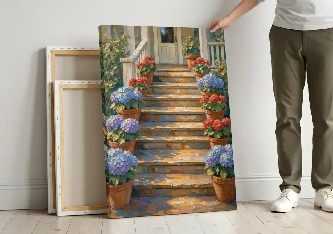Hydrangea Wall Art on the Sunlit Porch Steps canvas wall art leaning against a wall next to blank canvases