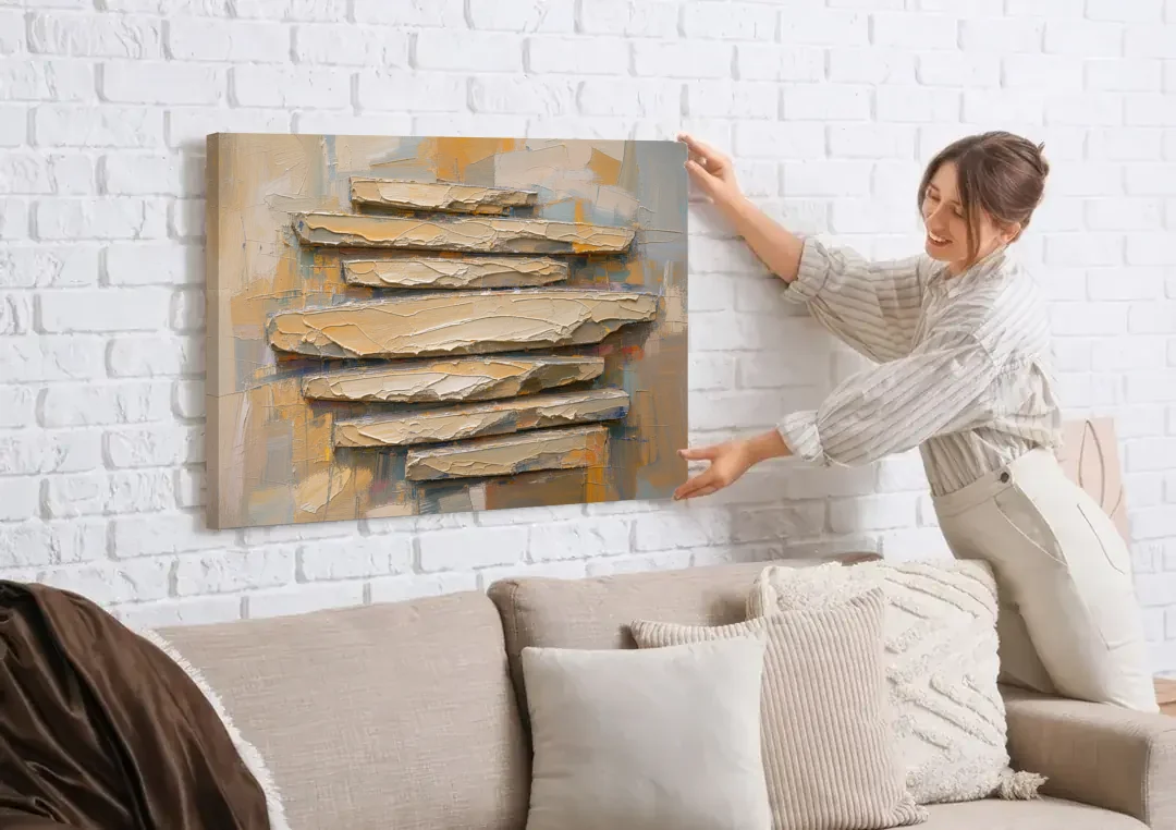 Impasto Abstract Painting of Stacked Limestone Plates canvas wall art being hung on a white brick wall above a sofa