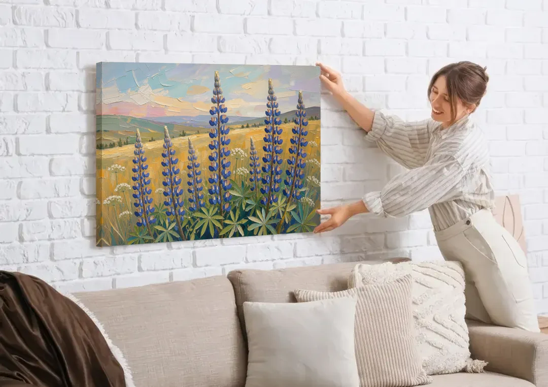 Impasto Flower Painting of Blue Lupines canvas wall art being hung on a white brick wall above a sofa