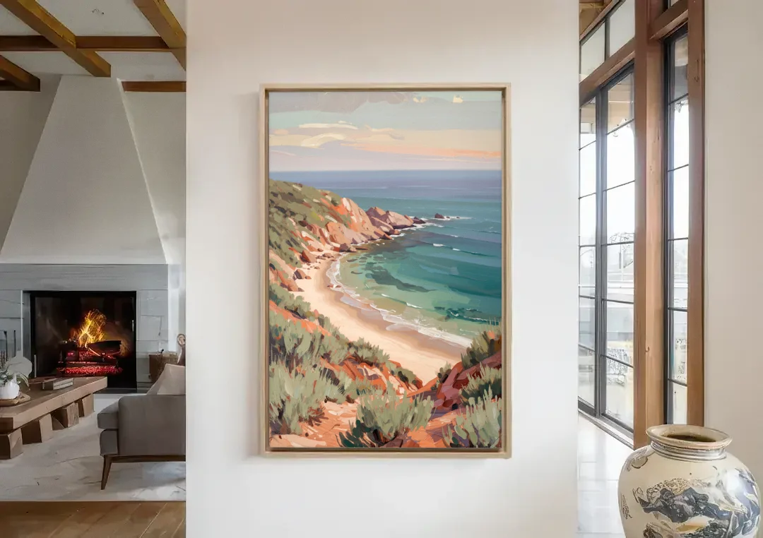 Impressionist Beach Painting of a Clifftop Cove canvas wall art in a living room with a fireplace