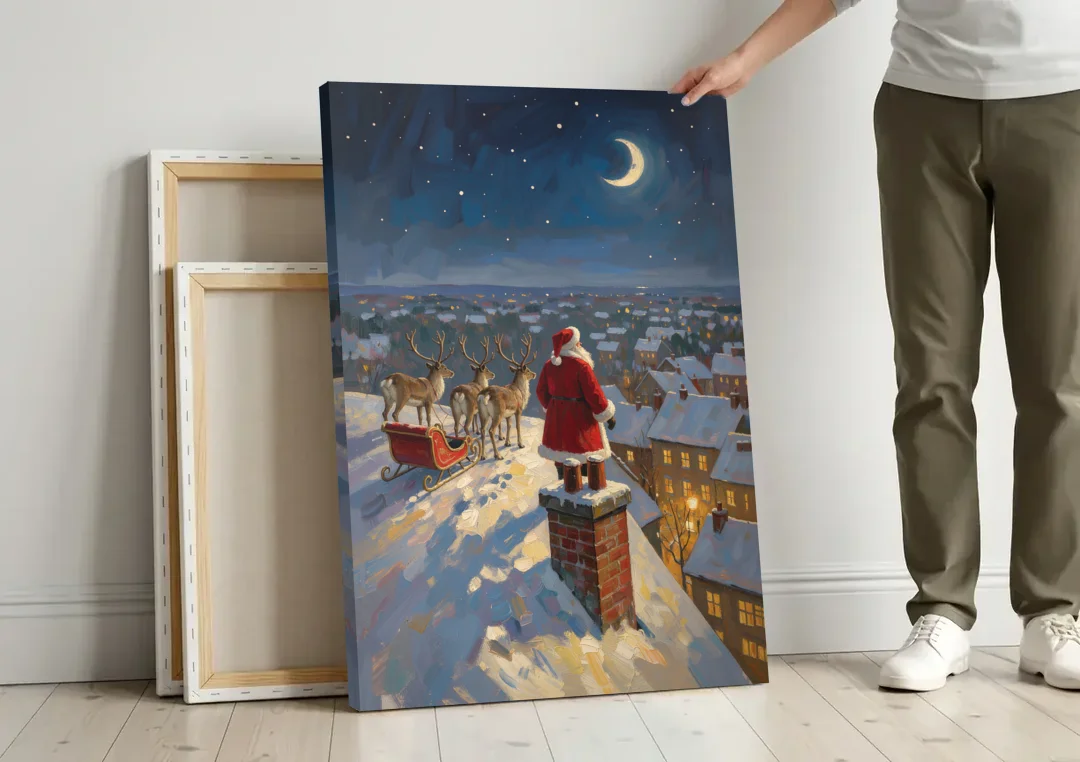 Impressionist Christmas Painting of Santa on the Rooftop canvas wall art leaning against a wall next to blank canvases