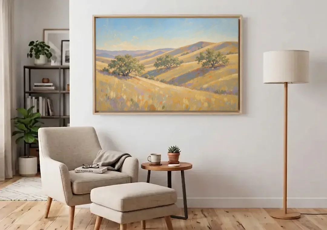 Impressionist Landscape Painting with Golden Oak Hills canvas wall art above an armchair in a bright living room
