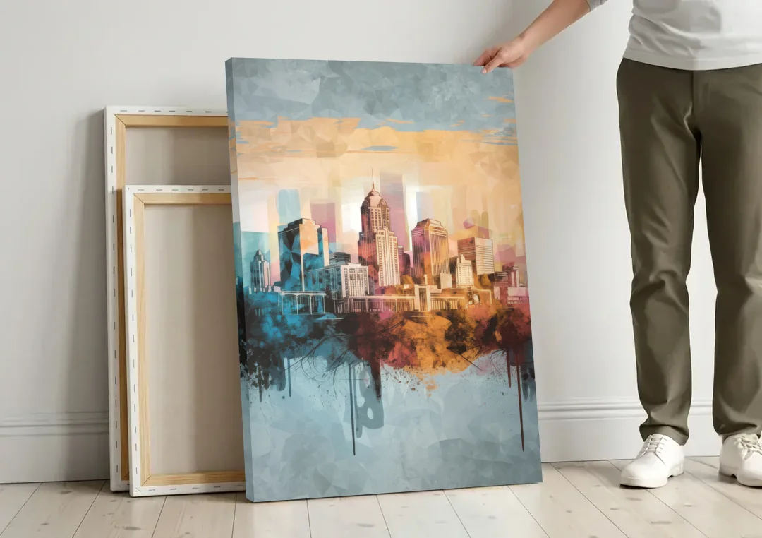 Indianapolis Cityscape in Watercolor canvas wall art leaning against a wall next to blank canvases