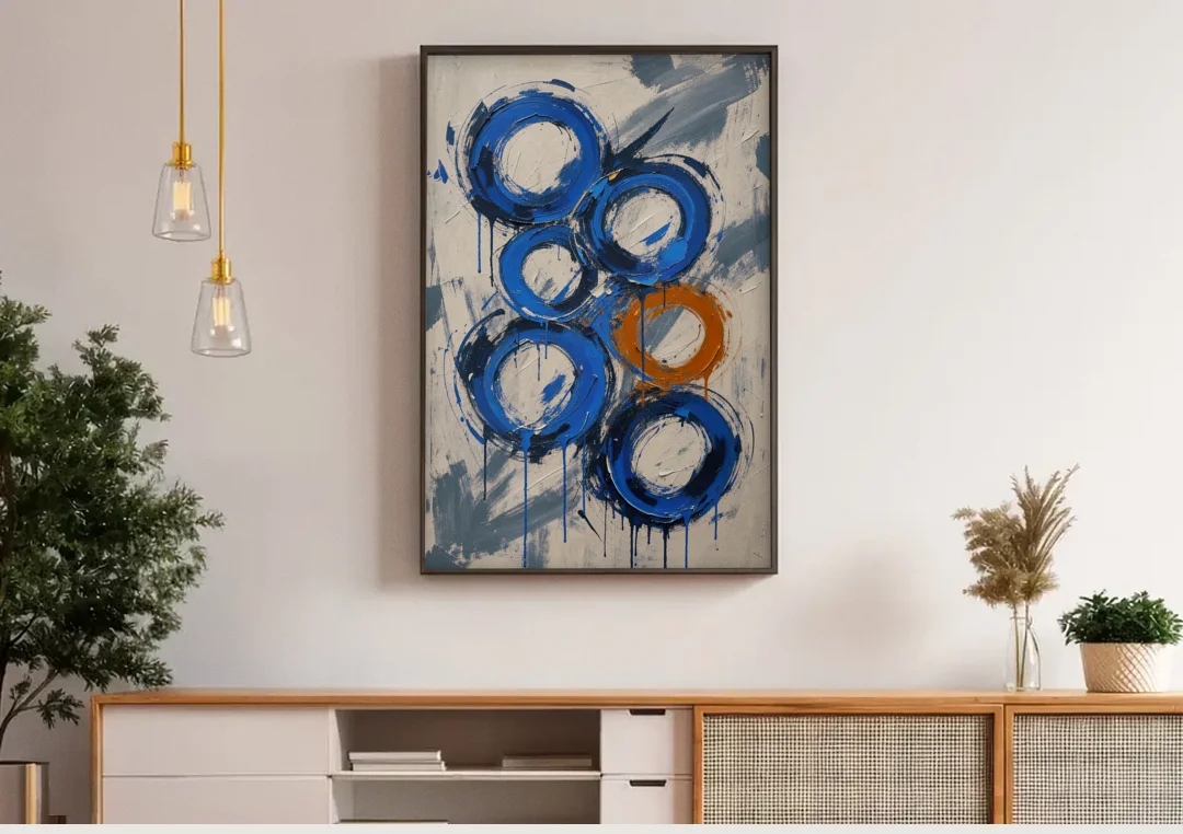 Indigo Wall Art with Five Dripping Rings canvas wall art above a wooden sideboard under pendant lights