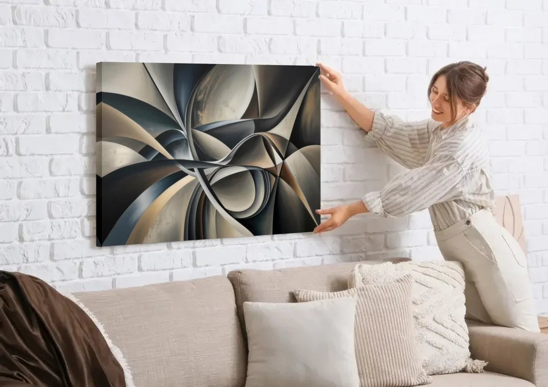 Intertwined Elegance Black and Grey Abstract canvas wall art being hung on a white brick wall above a sofa
