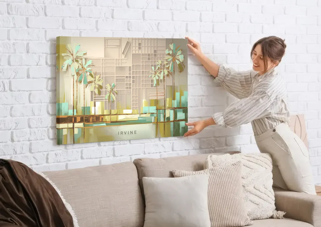 Irvine Urban Landscape canvas wall art being hung on a white brick wall above a sofa