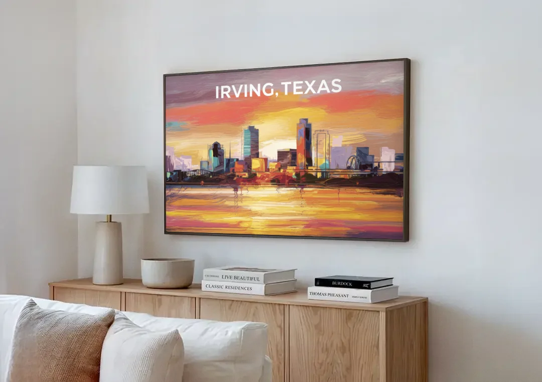 Irving Cityscape Sunset canvas wall art above a wooden sideboard next to a sofa