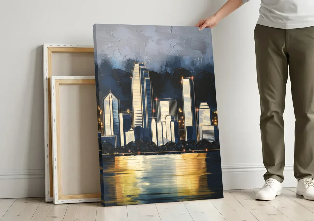 Irving Downtown Skyline canvas wall art leaning against a wall next to blank canvases