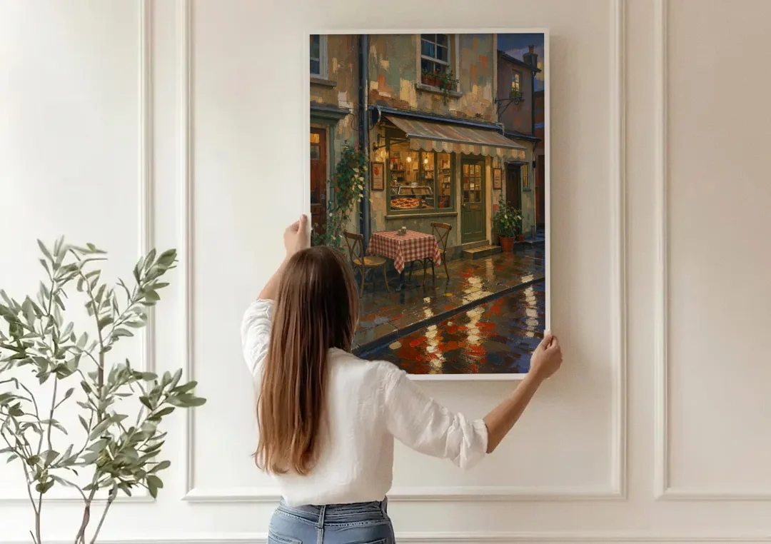 Italian Cafe on a Rainy Evening canvas wall art being hung on a paneled wall