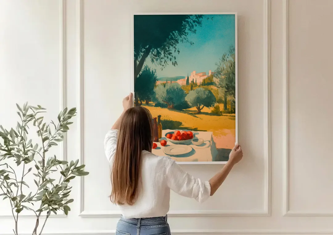 Italian Countryside Painting with a Picnic Table canvas wall art being hung on a paneled wall