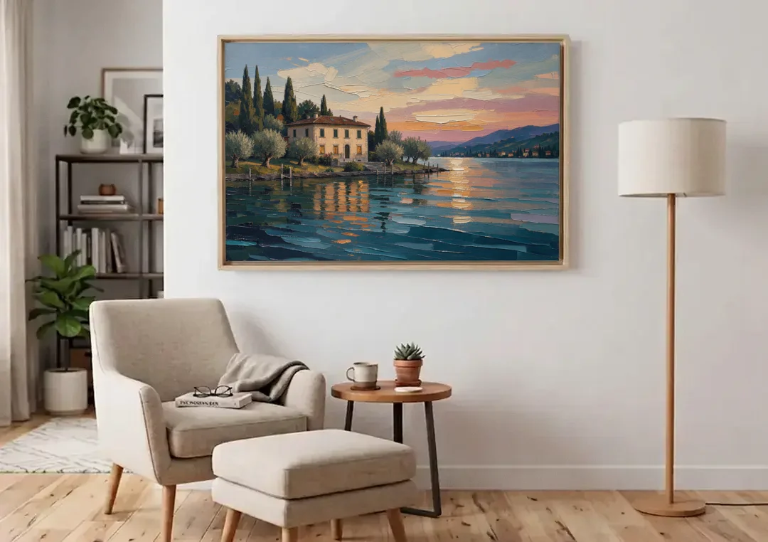 Italian Lakeside Villa at Dusk canvas wall art above an armchair in a bright living room