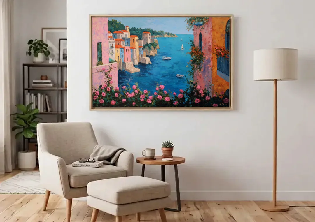 Italian Painting of a Village in Roses canvas wall art above an armchair in a bright living room