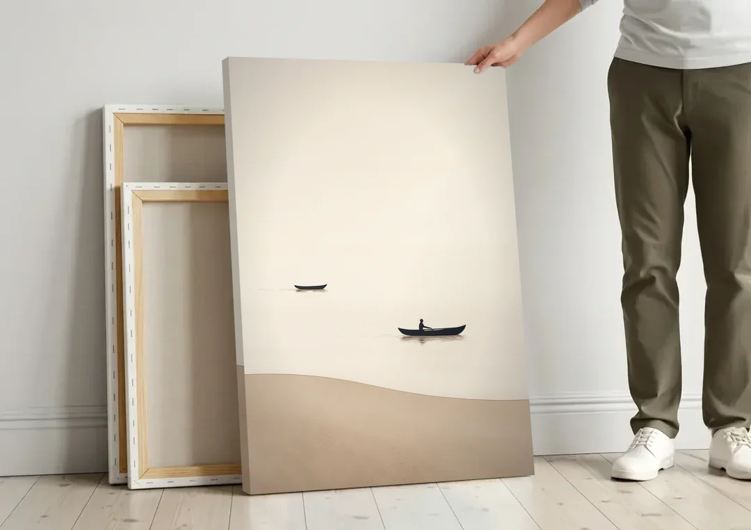 Ivory Wall Art with Two Boats Adrift canvas wall art leaning against a wall next to blank canvases