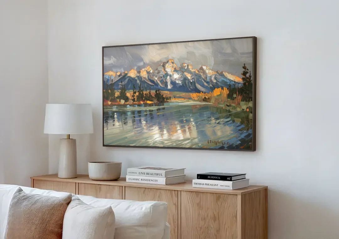 Jackson Hole River Reflection canvas wall art above a wooden sideboard next to a sofa