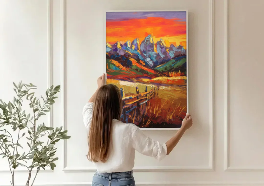 Jackson Hole Sunset Glow canvas wall art being hung on a paneled wall