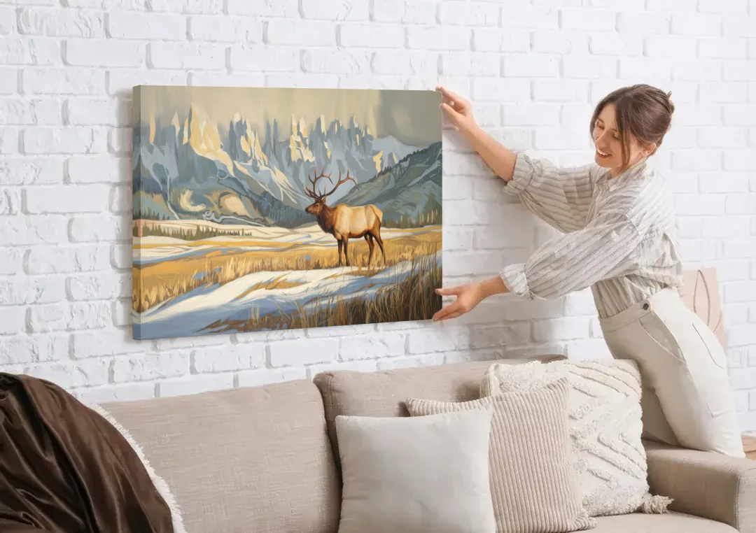 Jackson Hole Wildlife Serenade canvas wall art being hung on a white brick wall above a sofa