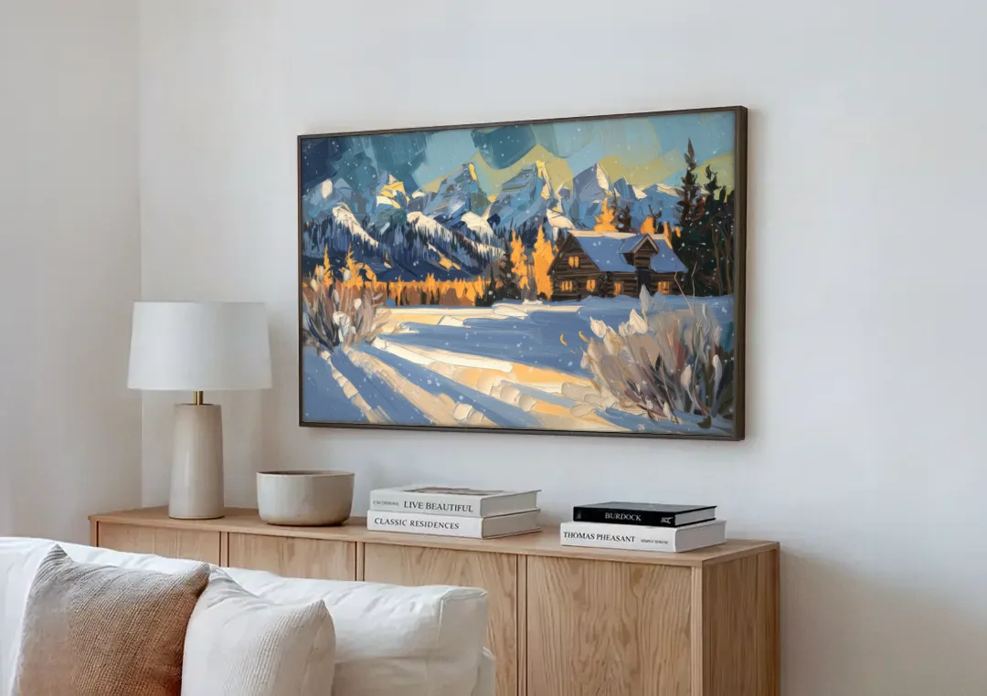 Jackson Hole Winter Wonderland canvas wall art above a wooden sideboard next to a sofa