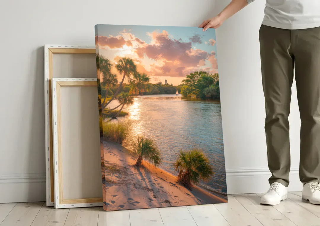 Jacksonville St. Johns River canvas wall art leaning against a wall next to blank canvases