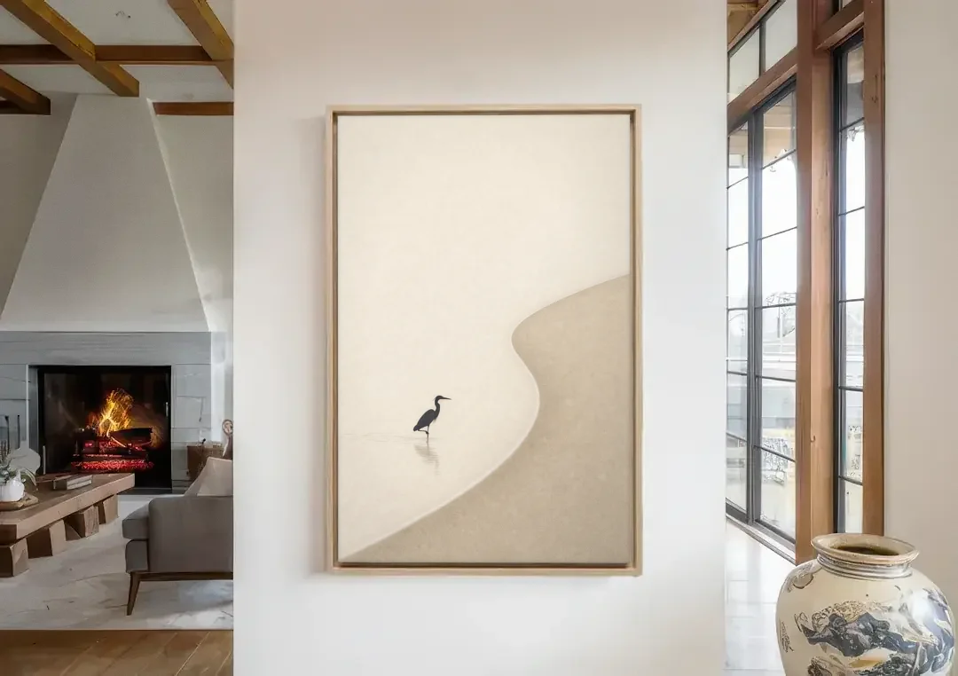Japanese Minimalist Art of a Heron in the Shallows canvas wall art in a living room with a fireplace