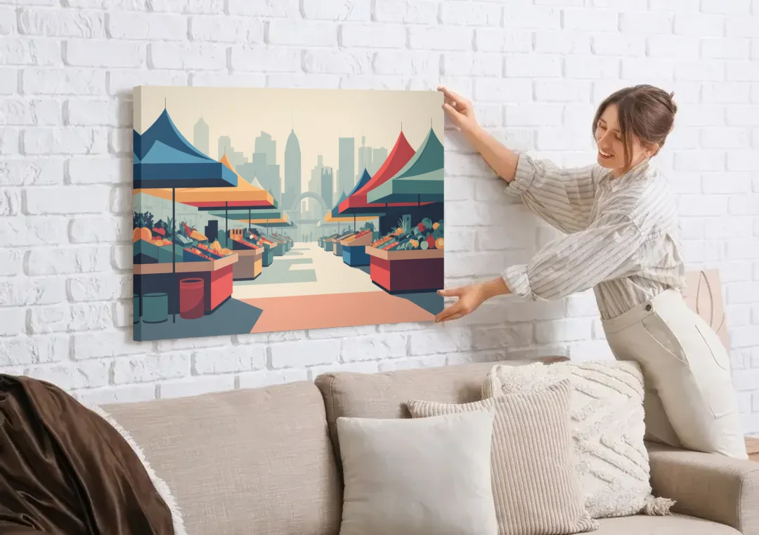 Jean Talon Market canvas wall art being hung on a white brick wall above a sofa