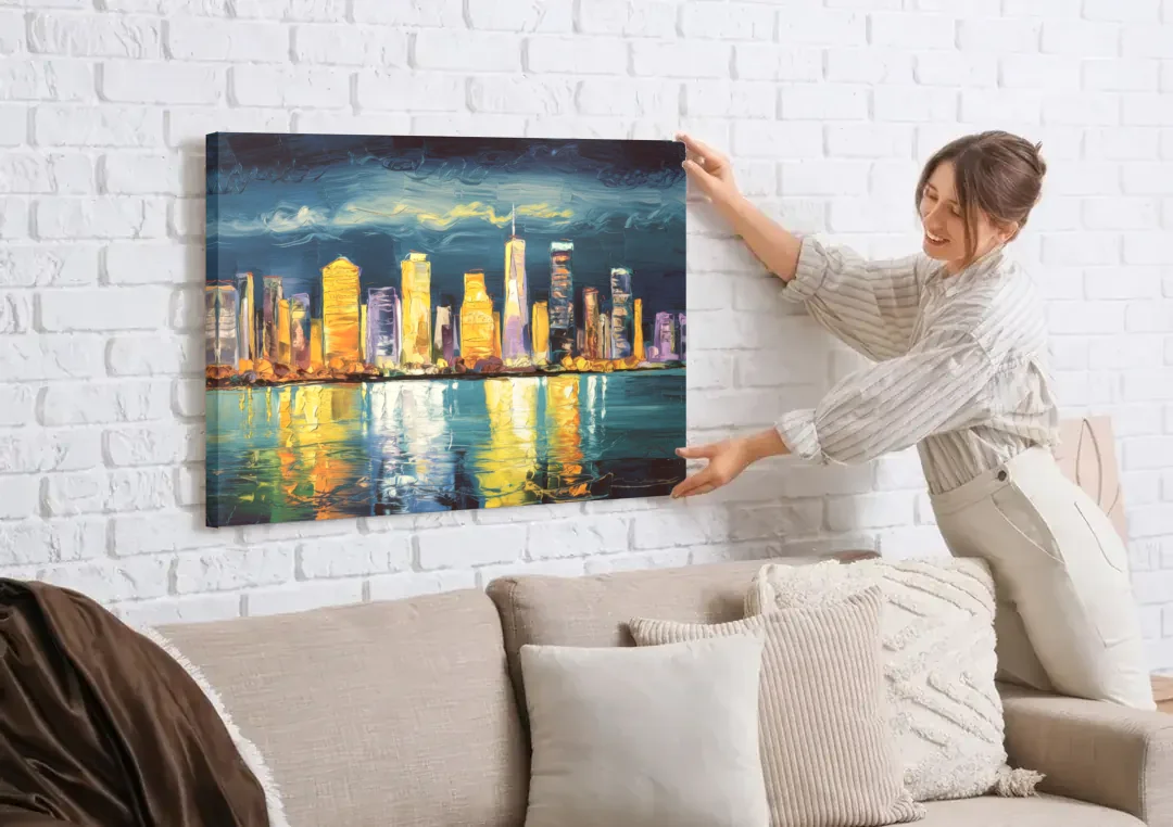 Jersey City Night Lights canvas wall art being hung on a white brick wall above a sofa