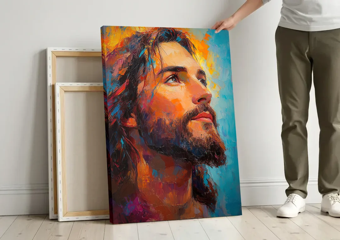 Jesus in Light Christian Absctact canvas wall art leaning against a wall next to blank canvases