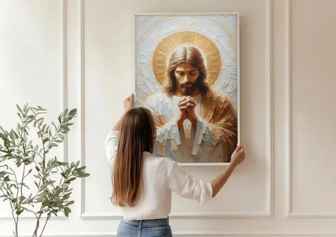 Jesus Praying canvas wall art being hung on a paneled wall