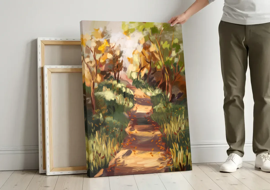 Joseph Nature Trails canvas wall art leaning against a wall next to blank canvases