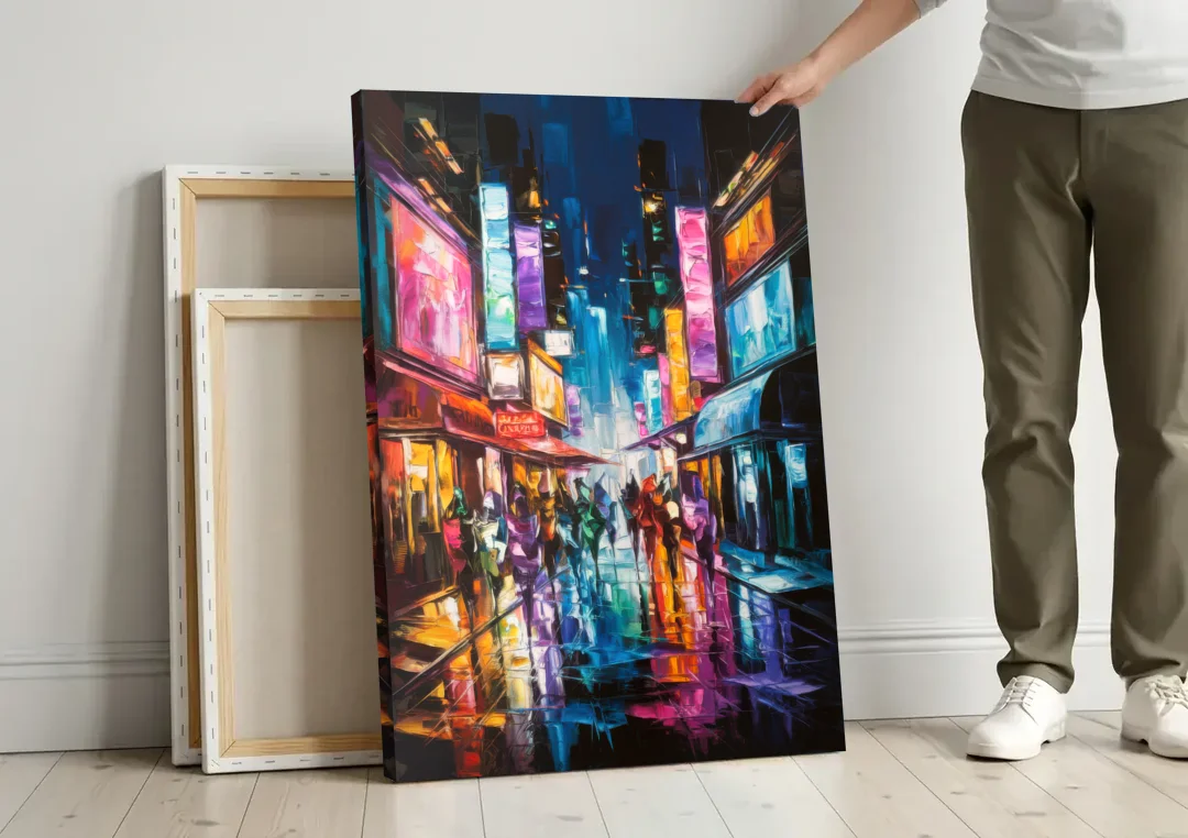 Joseph Vibrant Streets canvas wall art leaning against a wall next to blank canvases