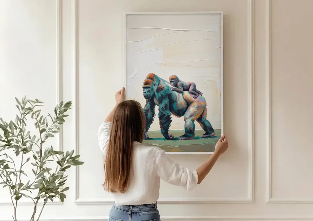 Jungle Animal Nursery Art with a Gorilla Piggyback canvas wall art being hung on a paneled wall