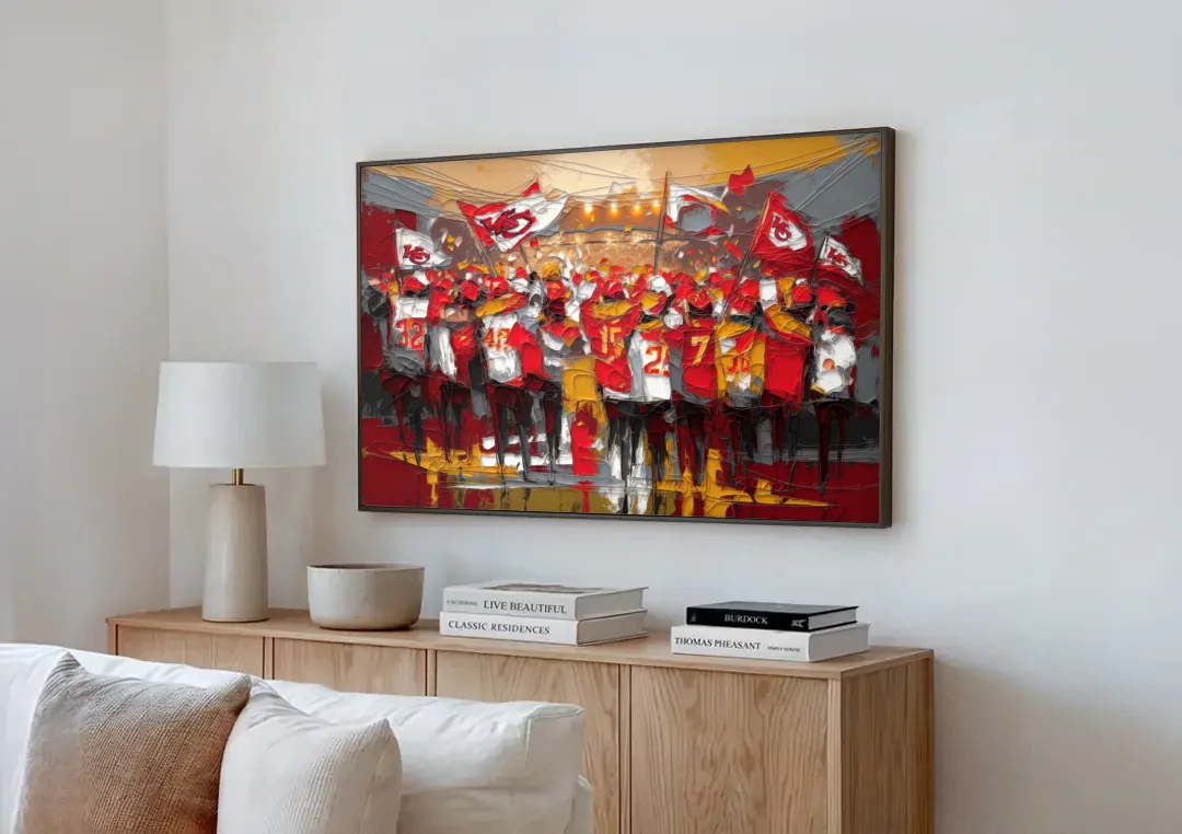 Kansas City Chiefs Fans Gathering canvas wall art above a wooden sideboard next to a sofa