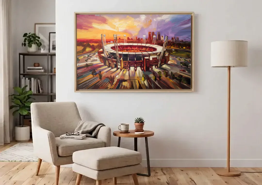 Kansas City Chiefs Stadium canvas wall art above an armchair in a bright living room