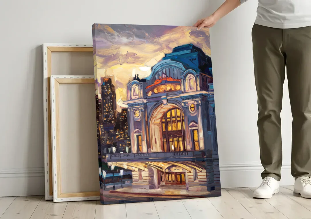 Kansas City Union Station canvas wall art leaning against a wall next to blank canvases